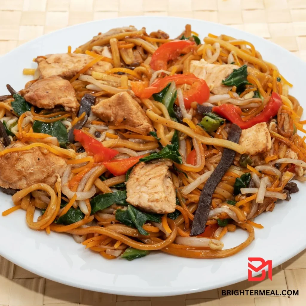 Bowl of homemade Chow Mein sauce with a spoon