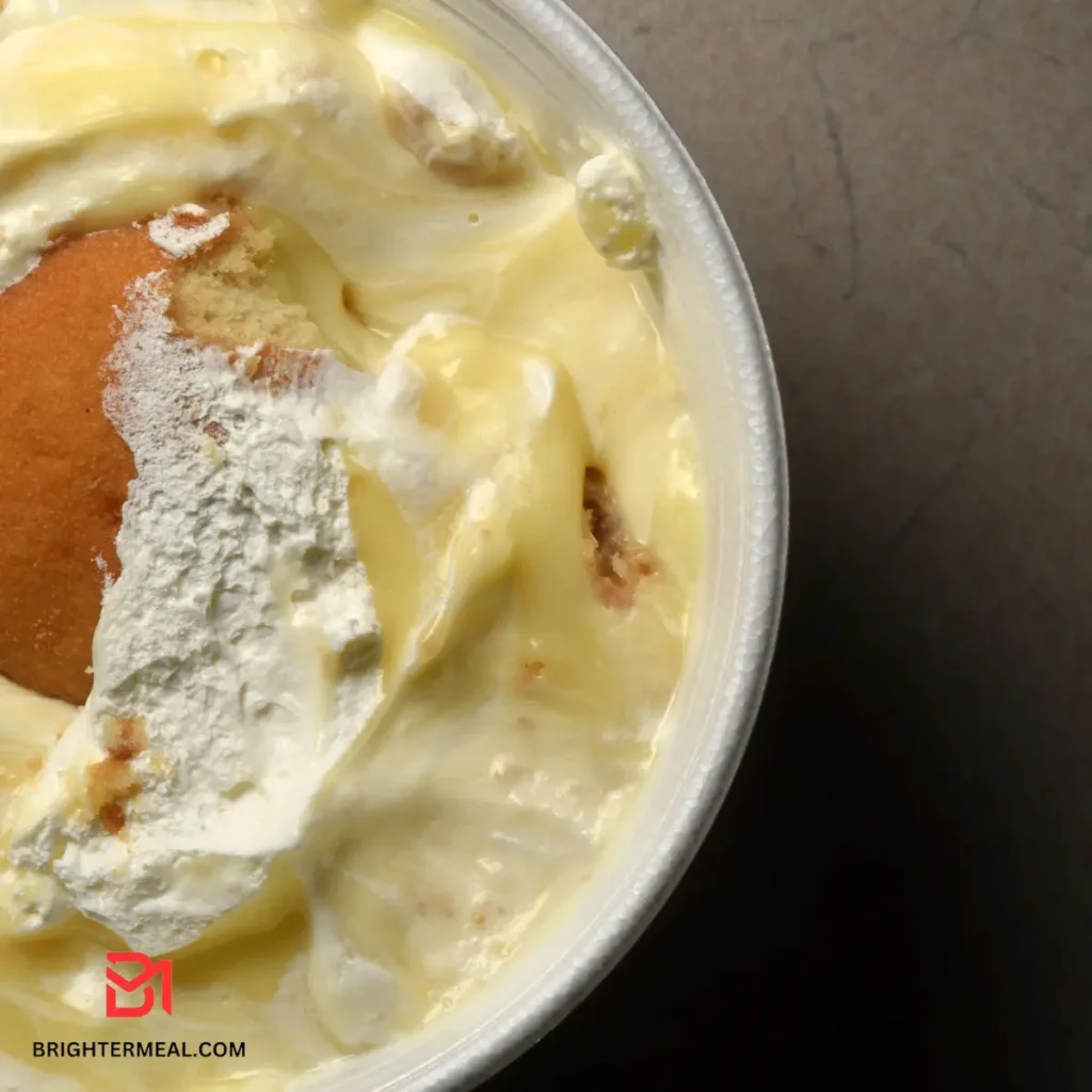 Creamy banana pudding with layers of cookies and fresh fruit.