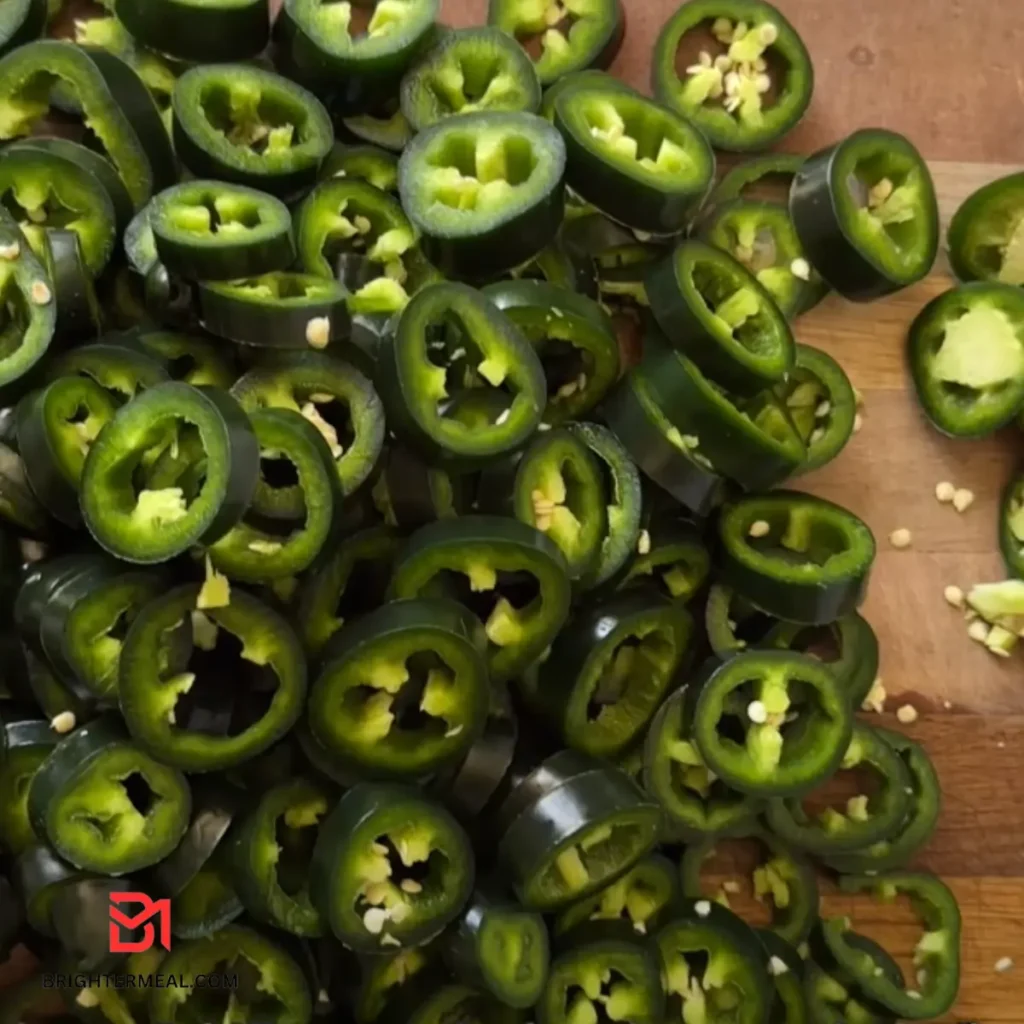 Garnish of candied peppers, enhancing the flavor of cheesy dishes