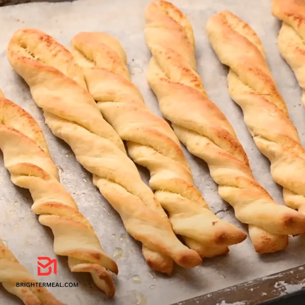 Golden-brown baked breadsticks with Parmesan