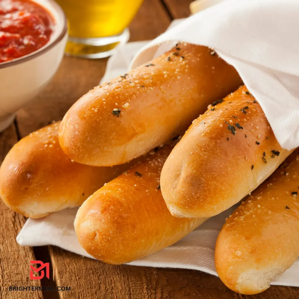 Freshly baked homemade breadsticks, golden brown and aromatic