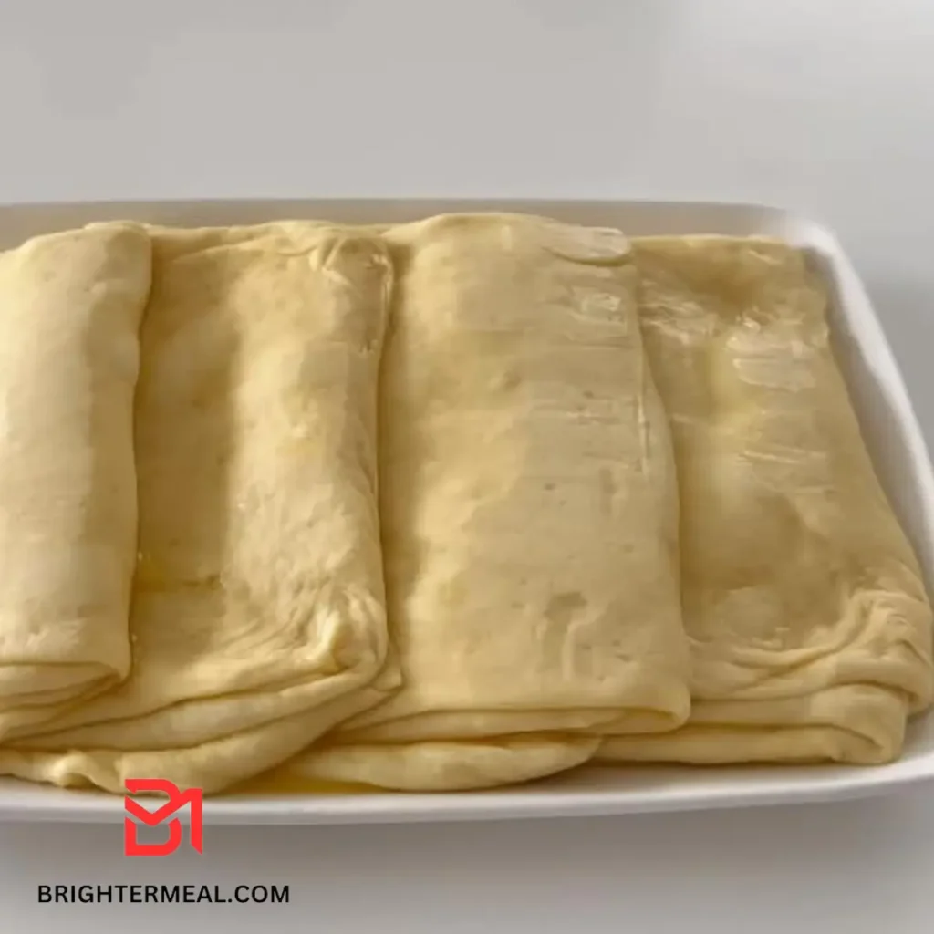 Traditional Lokma dessert sprinkled with pistachios.
