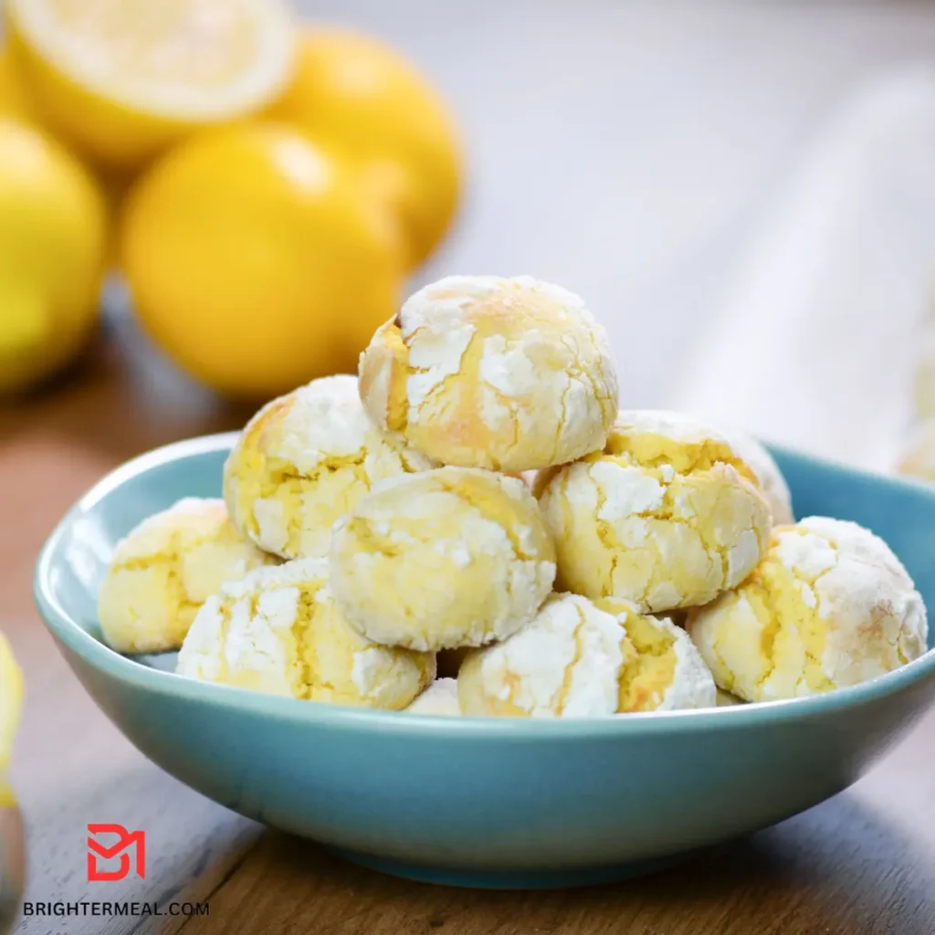 Freshly baked lemon crinkle cookies with a dusting of powdered sugar