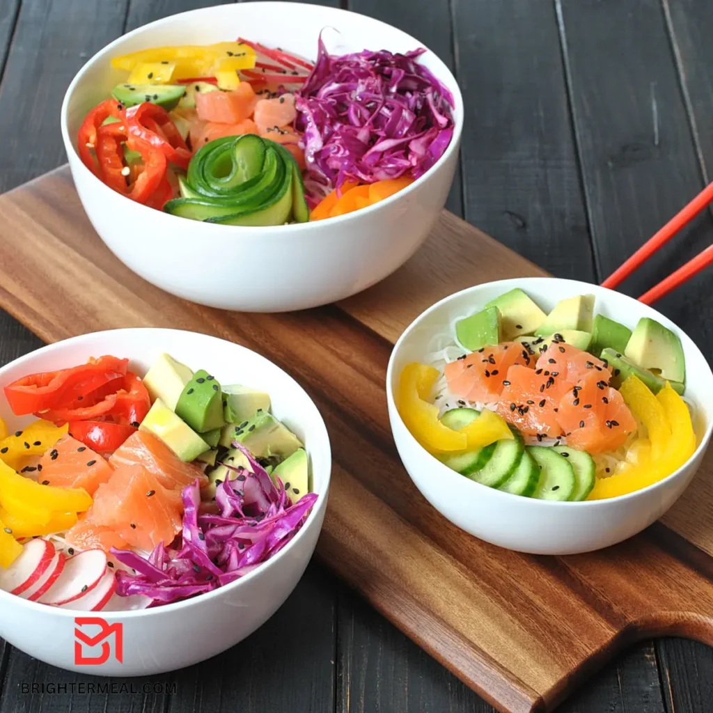 A delicious poke bowl with ahi tuna, brown rice, avocado, cucumber, and spicy mayo