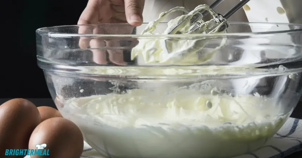 Layering sponge cake and cream