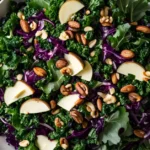 Assembling the kale and broccolini salad in a bowl.