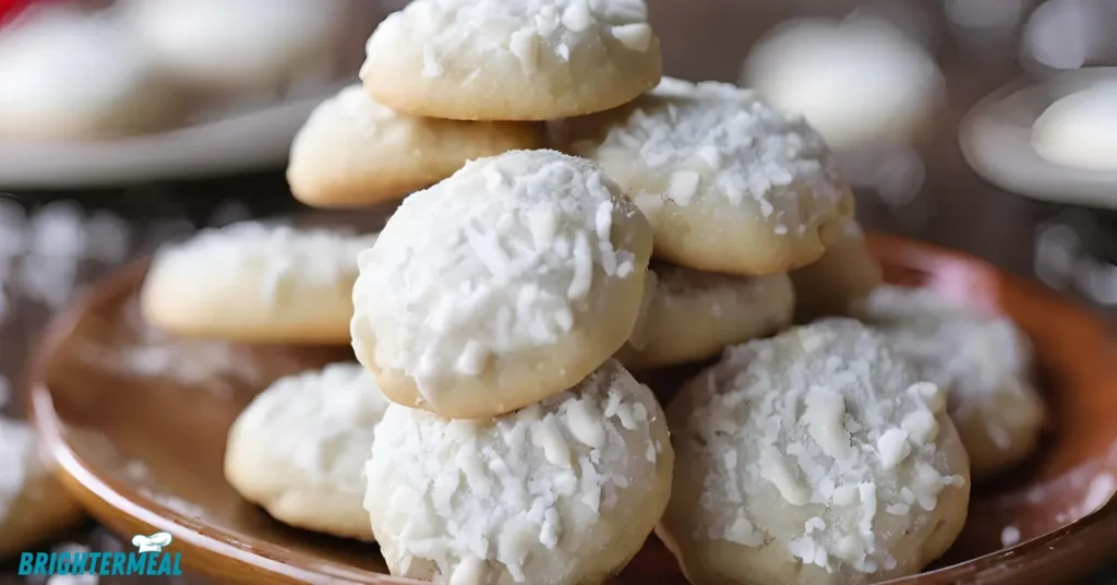 Dusting powdered sugar on cookies.