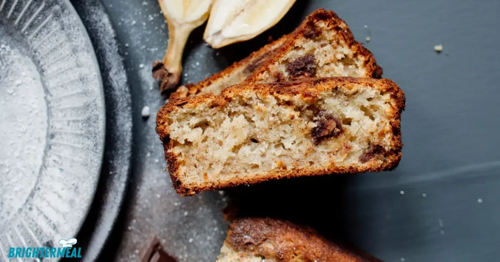 Chopped walnuts being added to the banana bread batter.