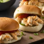 A plate of freshly cooked chicken sliders ready to serve
