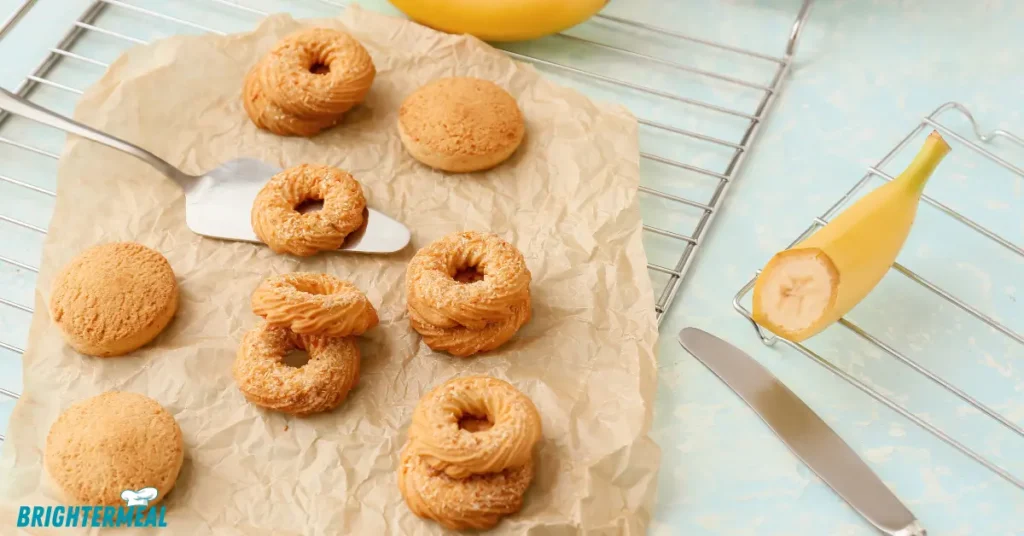 Freshly baked banana cookies cooling on a wire rack