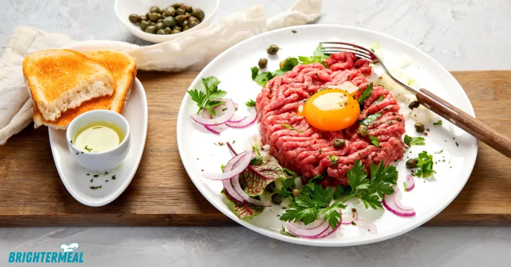 Finely chopped beef tenderloin for beef tartare recipe.