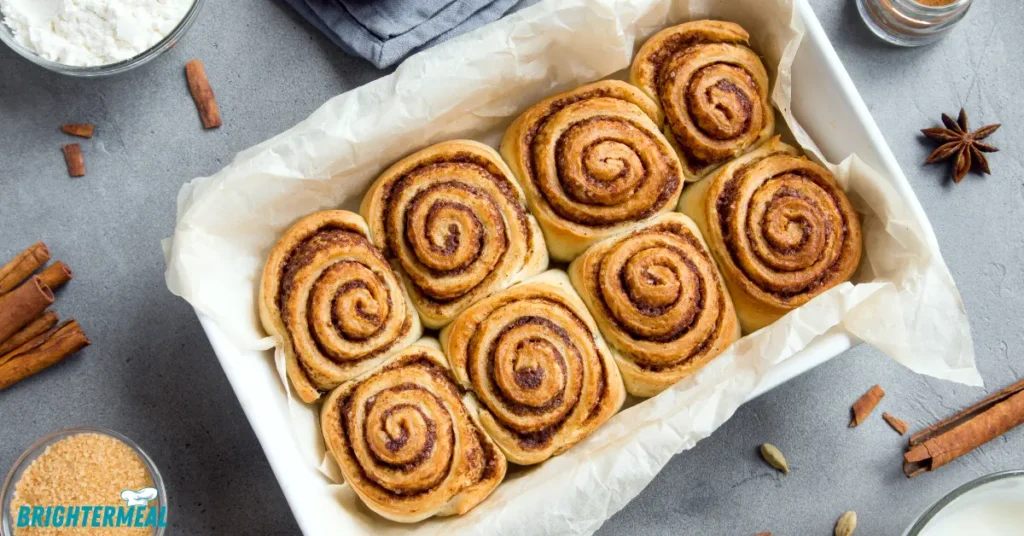 Freshly baked banana bread cinnamon rolls in a pan
