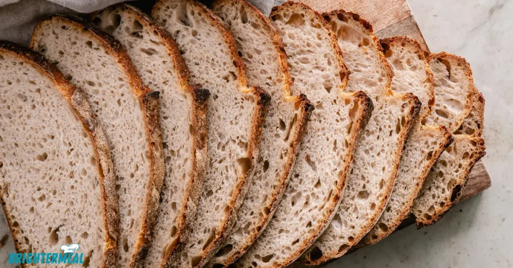 Sourdough sandwich bread slice showing soft crumb texture