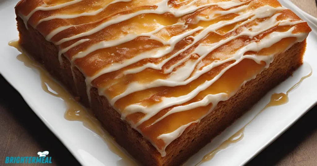 Honey bun cake with cinnamon swirl and vanilla glaze.