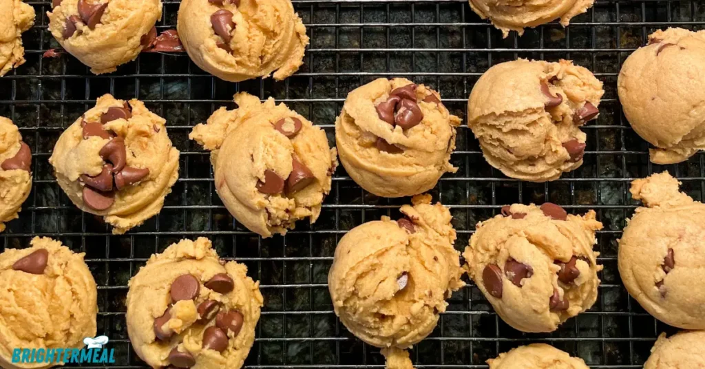 Stack of peanut butter chocolate chip cookies on a plate.