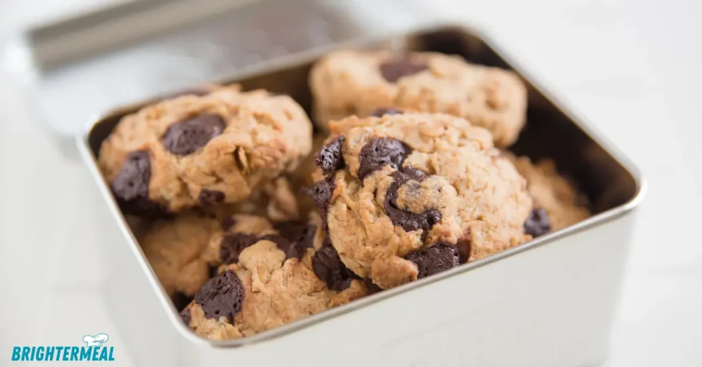 Mixing bowl with cookie dough and chocolate chips.
