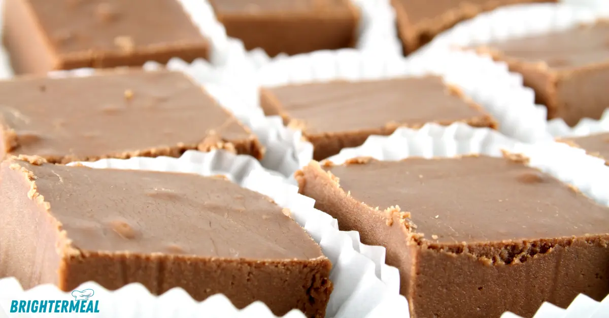 A stack of rich, creamy fudge squares.