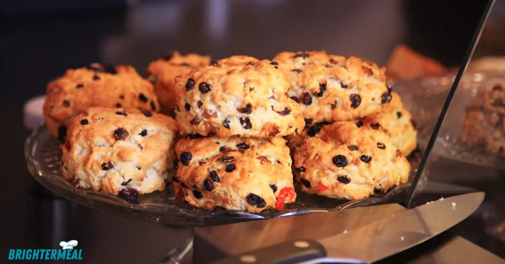 Sourdough scones served with jam and clotted cream.