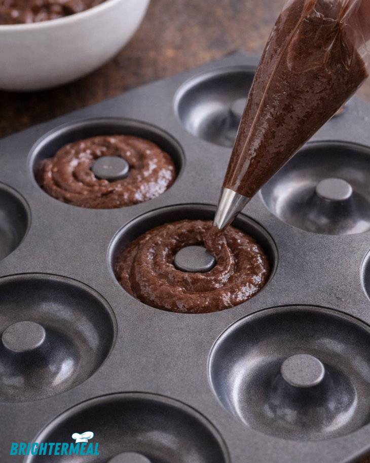 baked chocolate donuts cooling